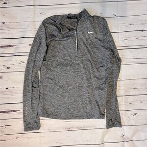 Women’s dry fit Nike running quarter zip long sleeve shirt.